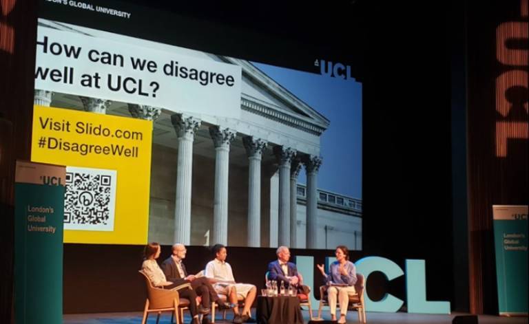 An image from the event titled: Disagreeing Well at ӰԺ. The photo contains 5 panellists sat on chairs on the Bloomsbury Theatre stage.