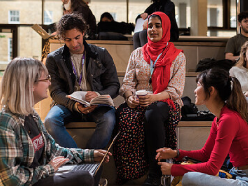 A group of students talk in the ӰԺ student centre
